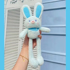 A plush rabbit with ears and legs that can be pulled to make them longer or shorter