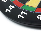 Close-up edge detail of a children's magnetic dartboard showing numbered sections and board thickness.