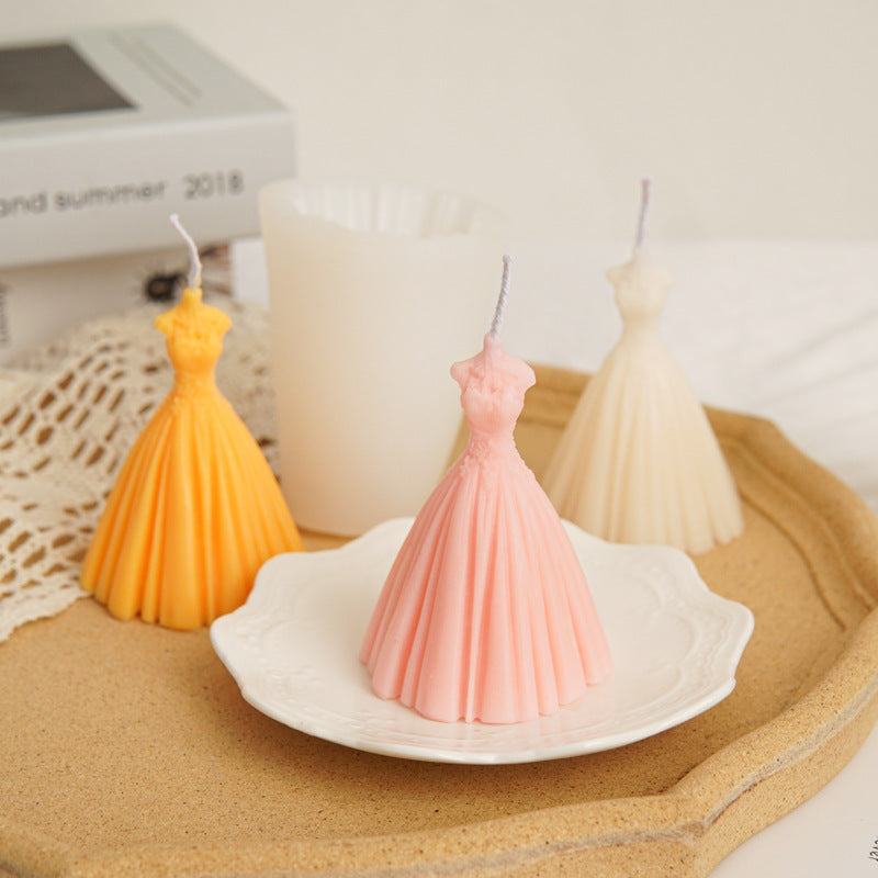 3D bridal wedding dress shaped silicone candle mold for DIY aromatherapy soy wax making, elegant gown design candle mould with finished samples in pink yellow and ivory, ideal for wedding favors, bridal shower gifts, home decor and handmade craft supplies