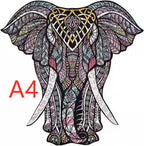 Detailed elephant head wooden puzzle with intricate patterns shown in A4 size.