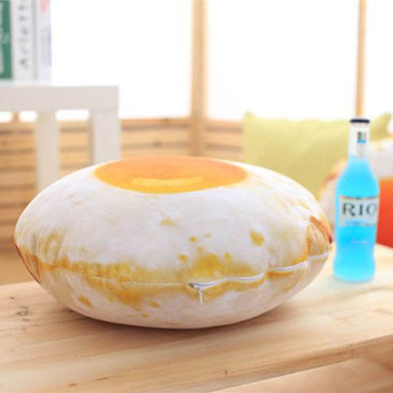Fried egg pillow plush toy side angle view, thick soft stuffed cushion with hidden zipper, realistic food shaped throw pillow detail shot