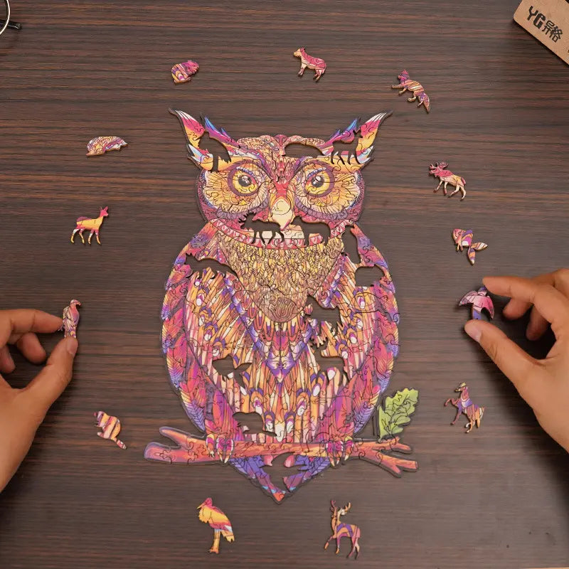 Animal Shaped Wooden Puzzles™ - Vibrant owl-shaped wooden jigsaw puzzle perched on a branch with whimsical forest animal pieces.