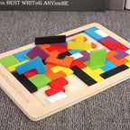 Wooden tetris puzzle game laid flat with colorful 3D geometric pieces standing on the board.