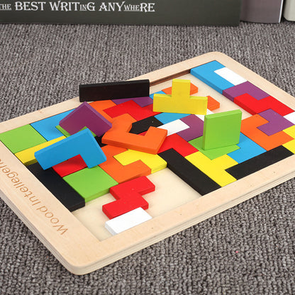 Wooden tetris puzzle game laid flat with colorful 3D geometric pieces standing on the board.