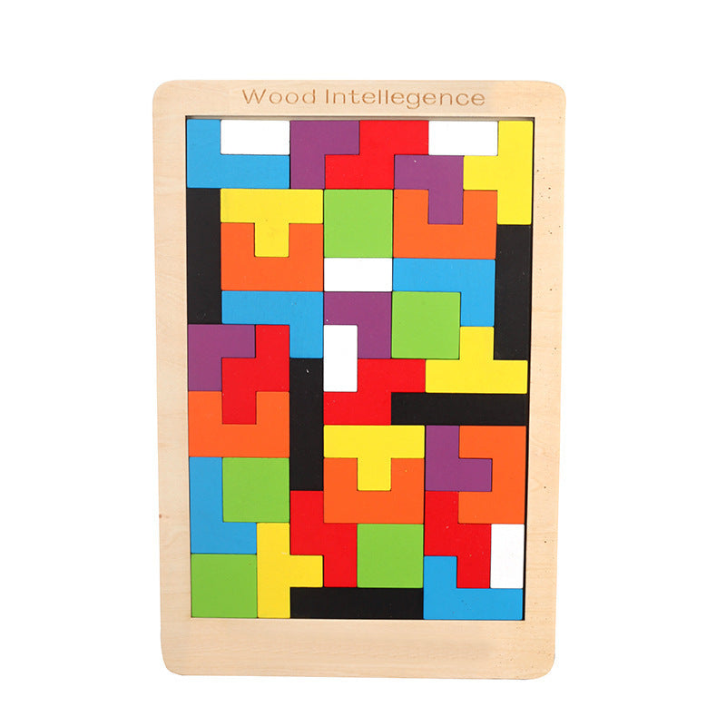 Fully solved colorful wooden tetris puzzle on a white background.
